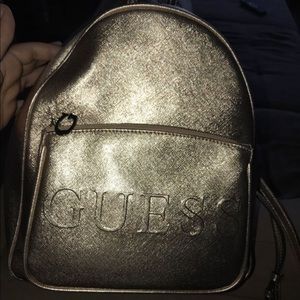 Rose gold guess backpack